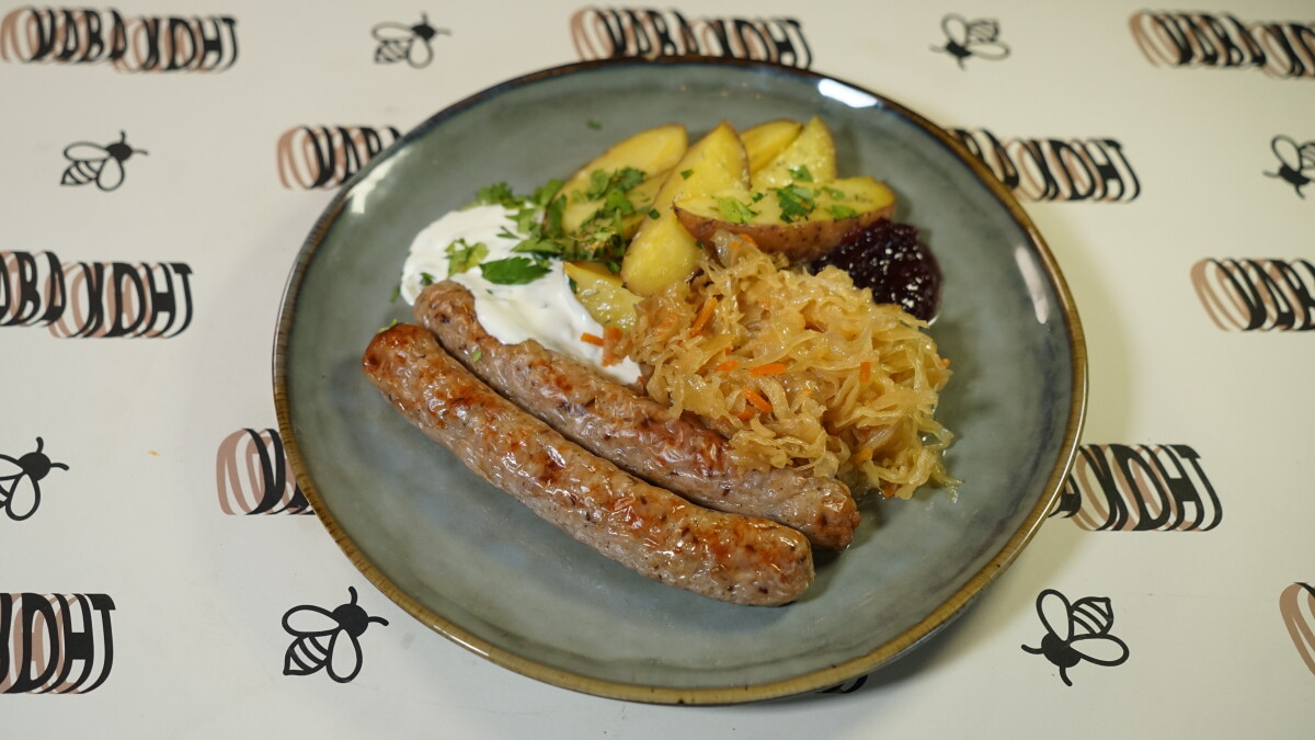 Grilled sausage with stewed cabbage